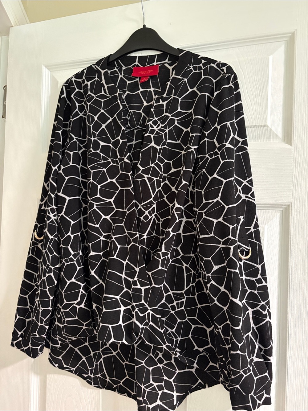 Jennifer Lopez Black and White Geometric V-Neck Blouse